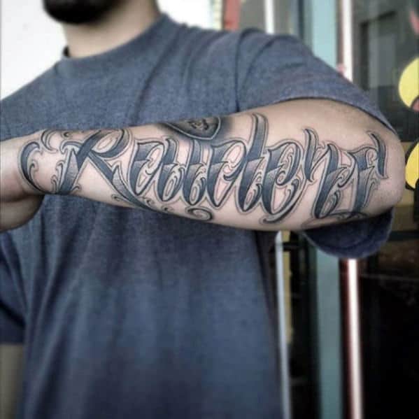 Unique Script Lettering Male Oakland Raiders Outer Forearm Tattoo Inspiration