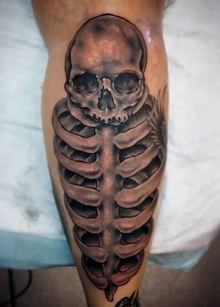 Skeleton on Calf Tattoo Idea