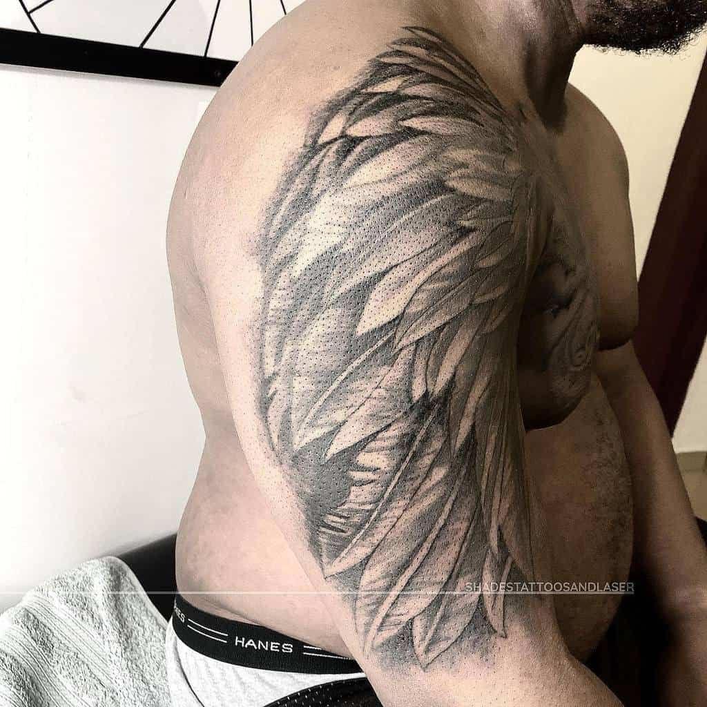 unique upper arm tattoos for men shadestattoosandlaser