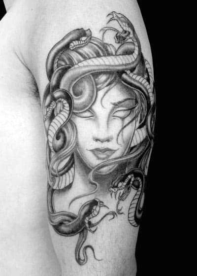 Upper Arm Black Ink Shading Medusa Tattoo Design Inspiration