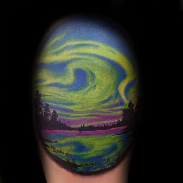 Upper Arm Glowing Northern Lights Tattoo For Males