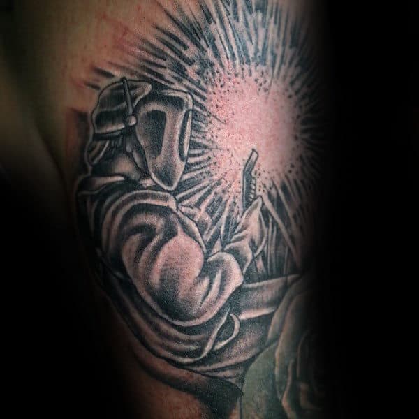 Upper Arm Male Welding Sparks Tattoos