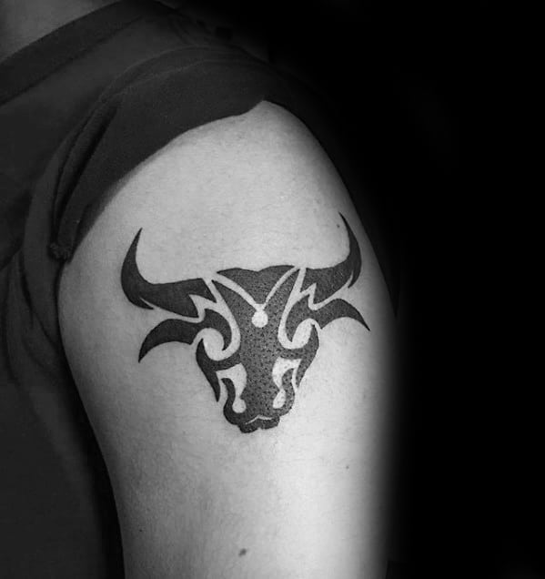 Upper Arm Small Tribal Bull Skull Tattoo Design For Men