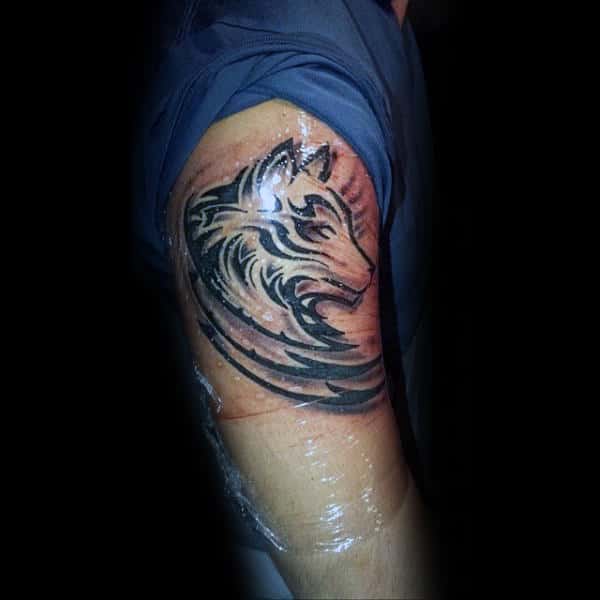 Upper Arm Tribal Wolf Gentlemens Tattoo Designs