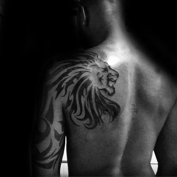 Upper Back And Shoulder Tribal Lion Male Tattoos