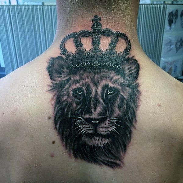 Upper Back Male Lion With Crown Tattoo Design Ideas