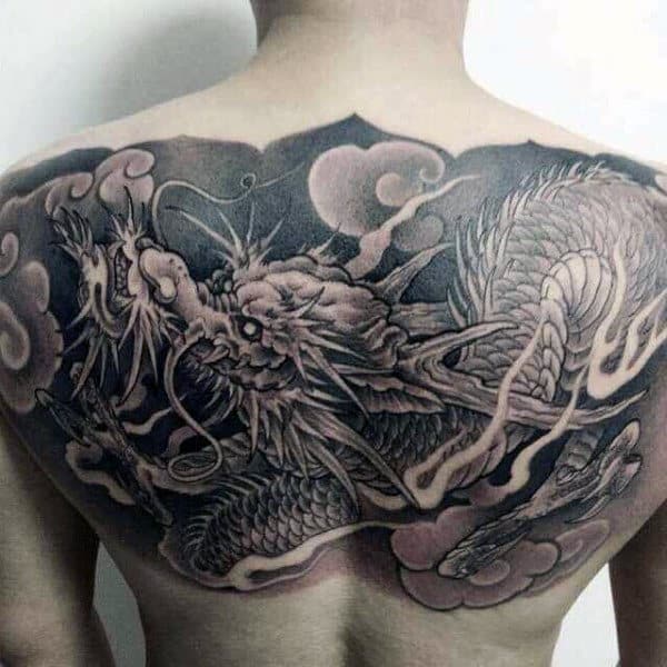 Upper Back Shaded Chinese Dragon Tattoo On Male