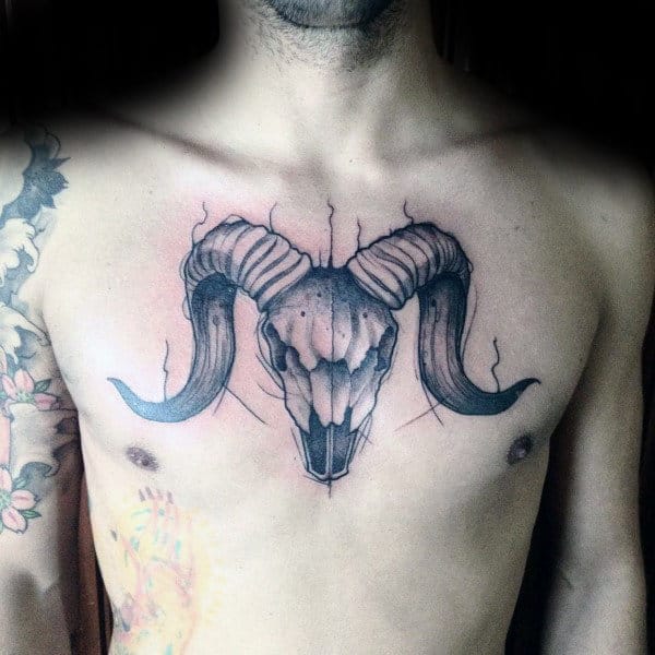 Upper Center Chest Aries Tattoo For Guys With Ram Skull Design