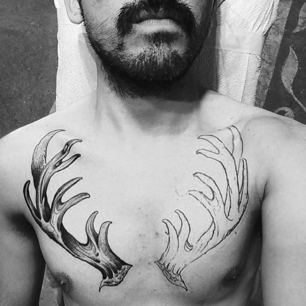 Upper Chest Antlers Tattoos For Guys