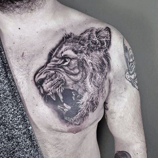 Upper Chest Black And Grey Ink Guys Realistic Lion Tattoo