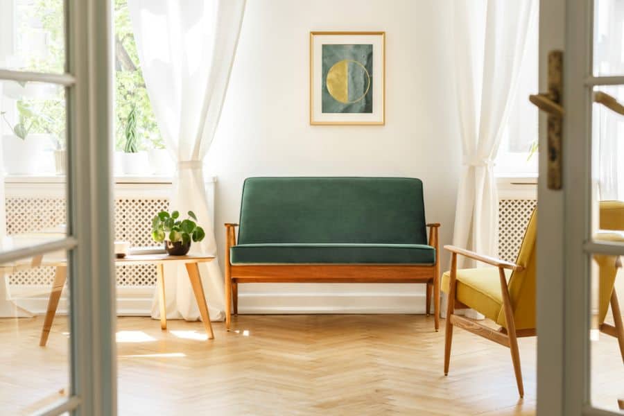 vintage green bench seat in mid-century modern living room 