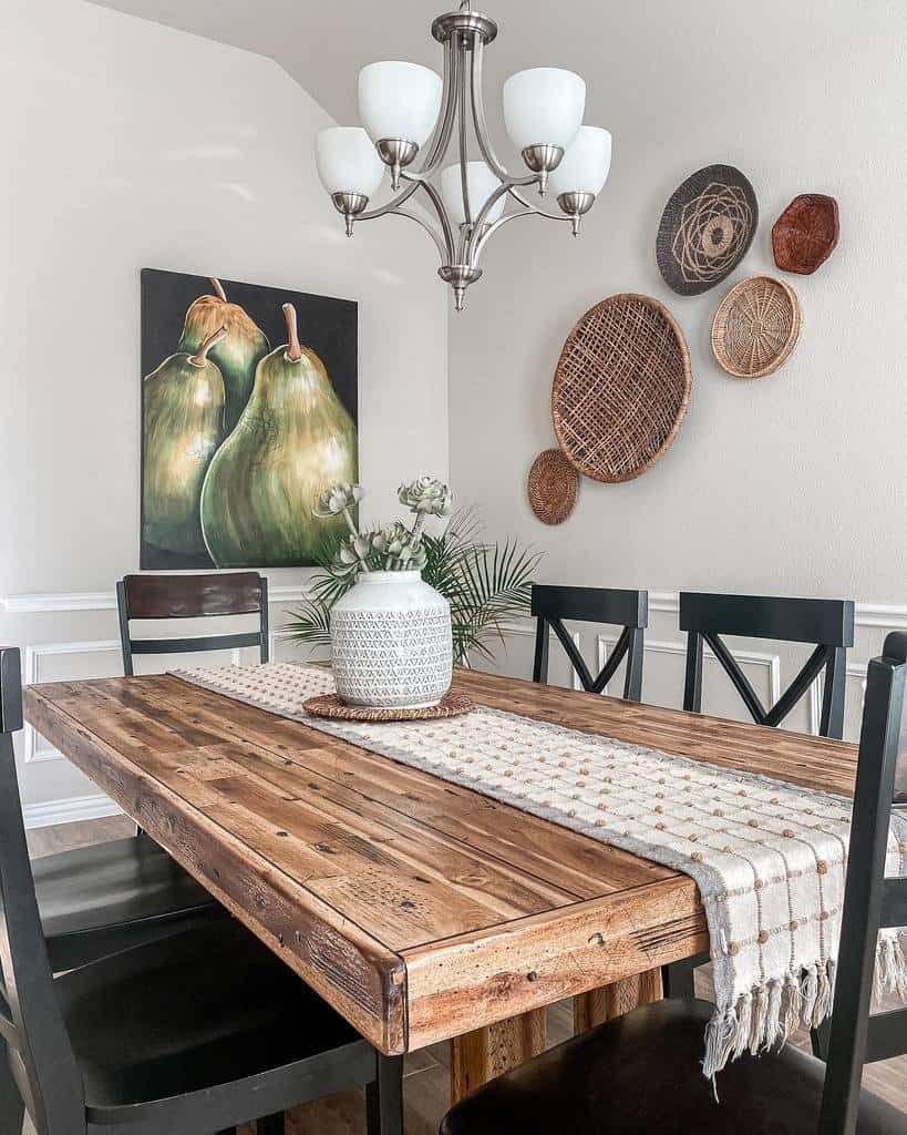 thick wood table five black chairs 