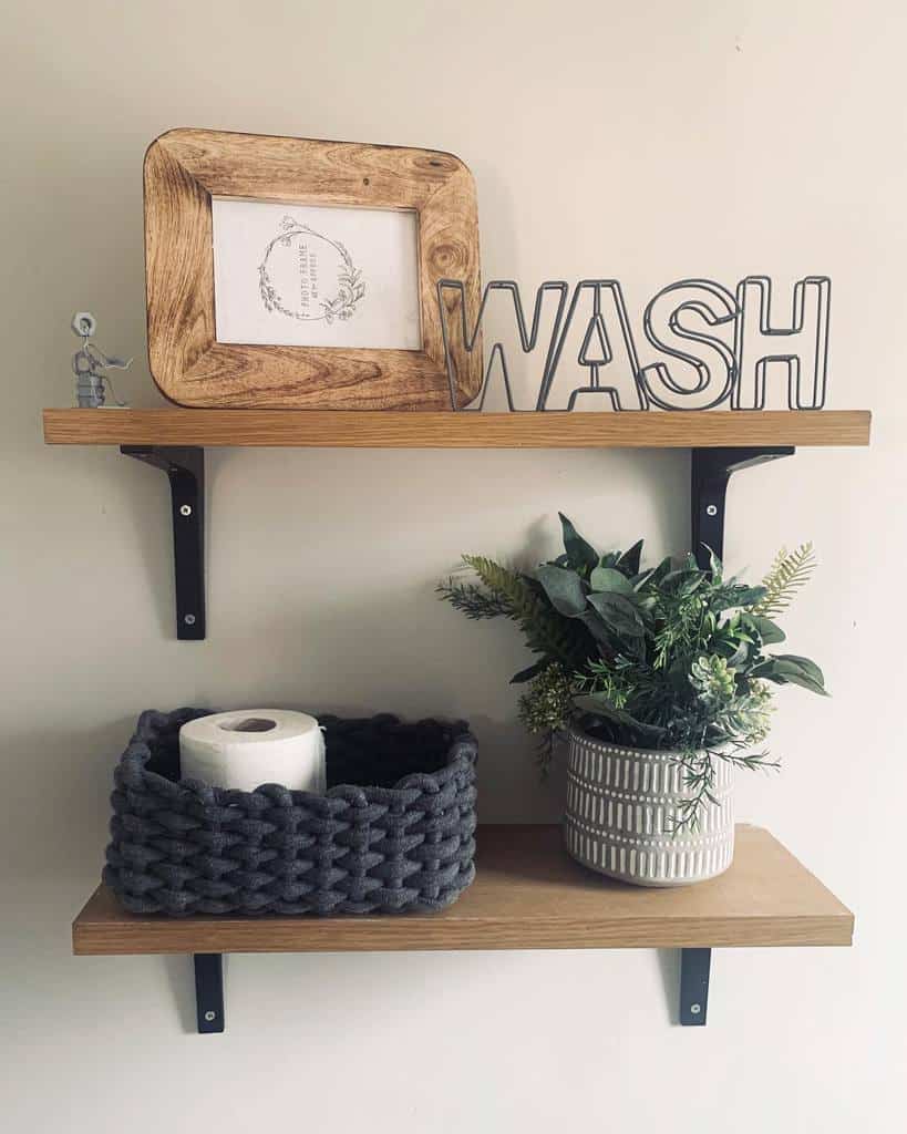 bathroom wood shelf with wash sign and pot plant 