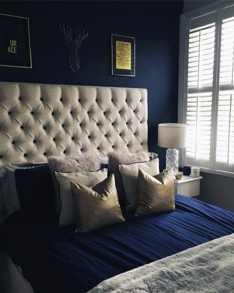 regal blue and gold trim bedroom 