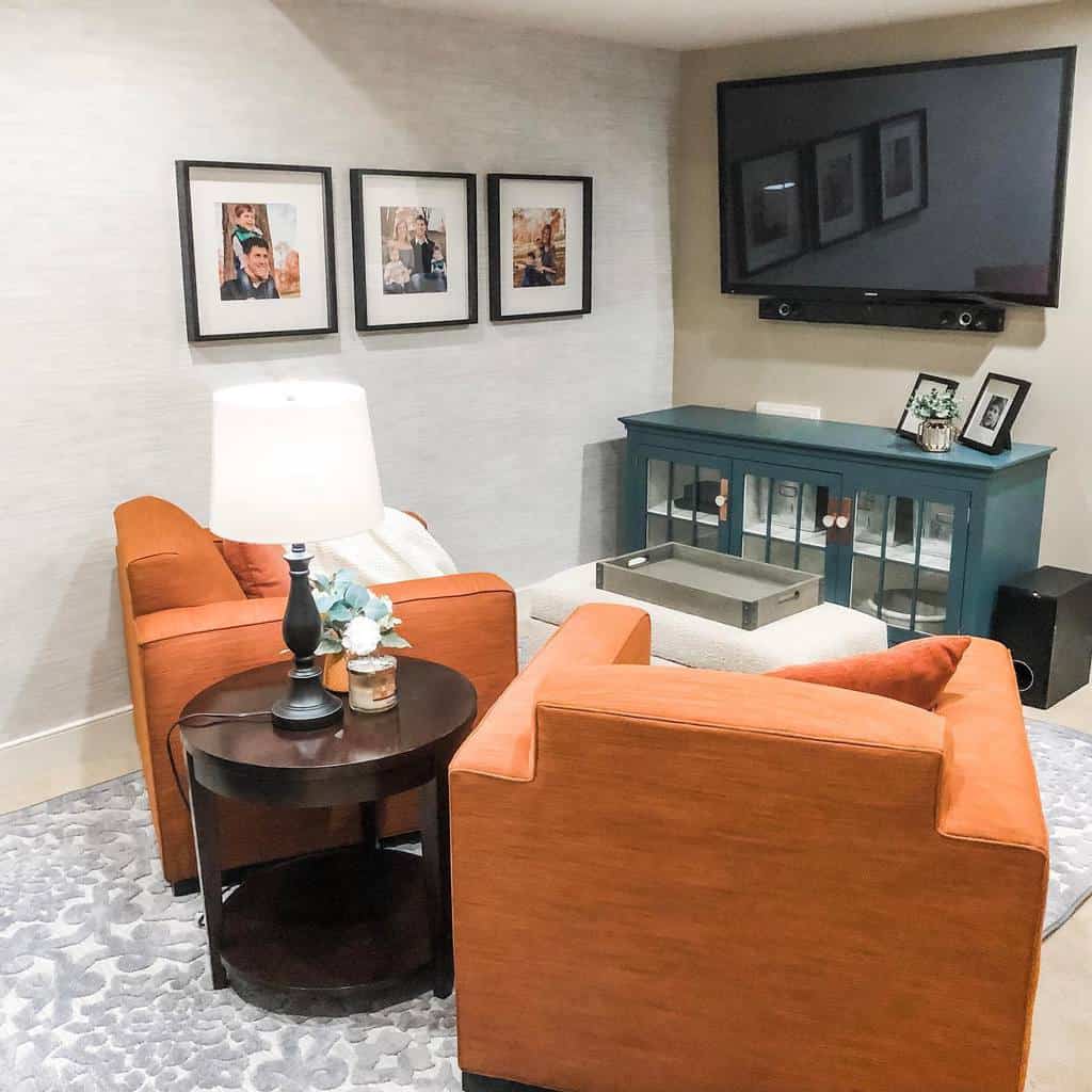 small living room with orange couches