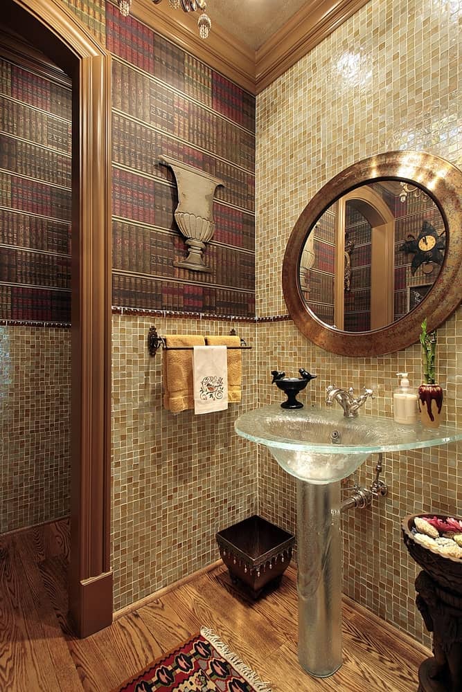 vintage powder room with bookcase wallpaper and tiles 