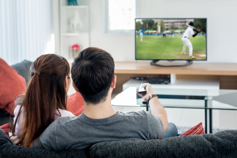 watch a sports game together to experience with your partner