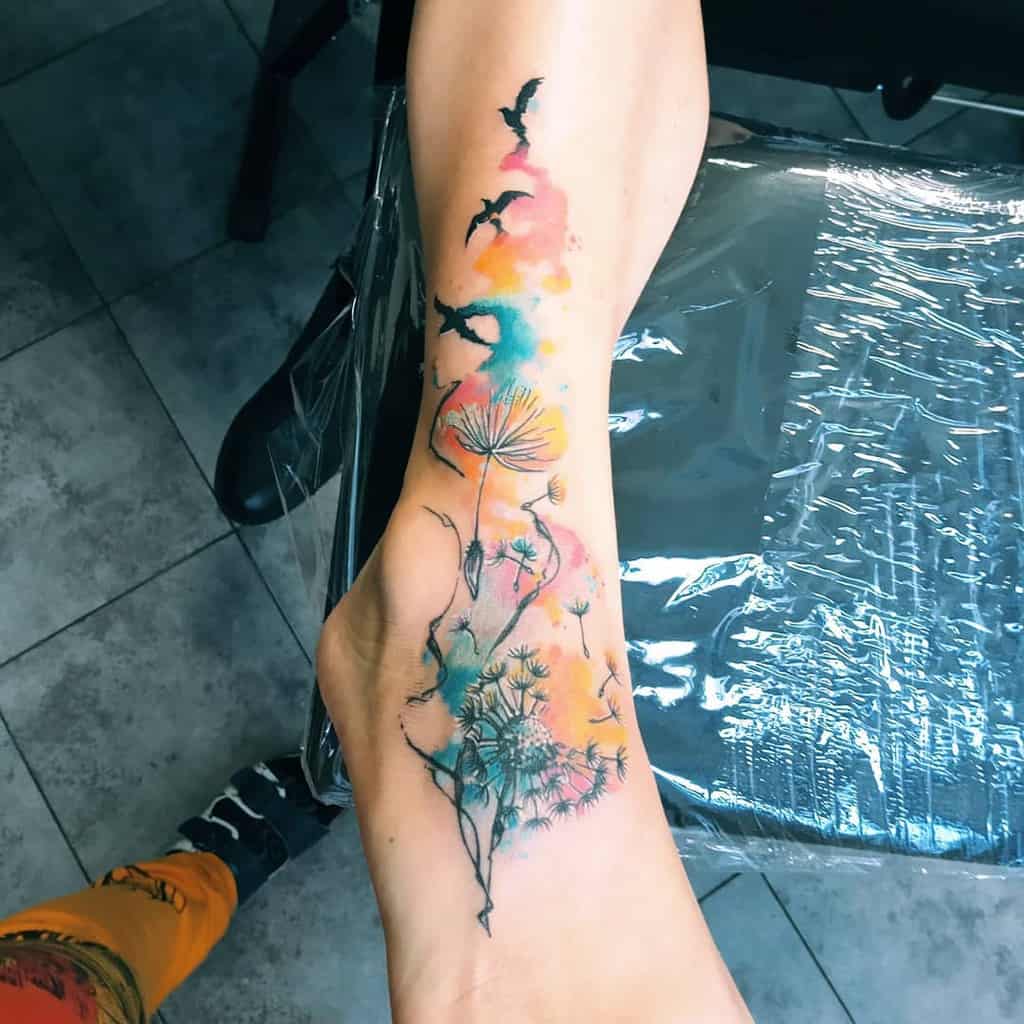 watercolor bird dandelion tattoo