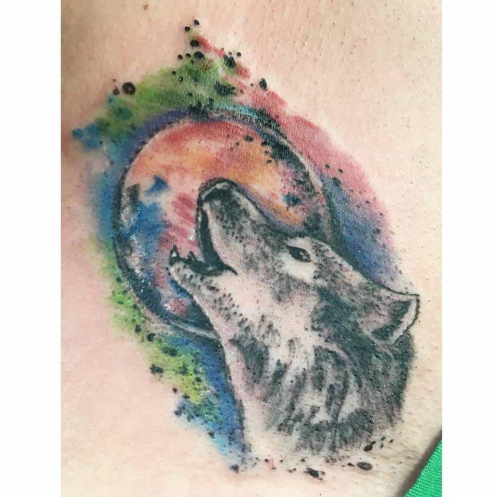 watercolor colorful howling wolf tattoo artatorture