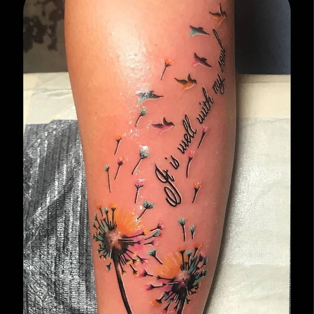 watercolor dandelion with texts tattoo