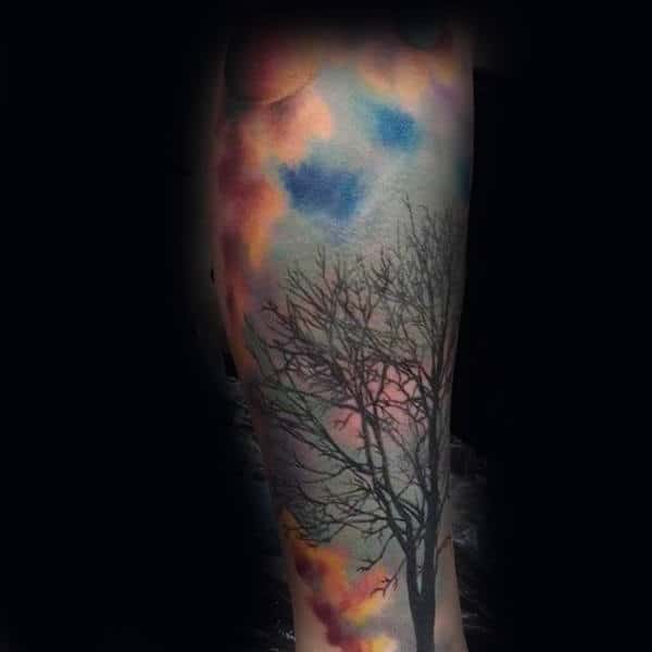 Watercolor Tattoo Of Sky With Colorful Clouds On Male
