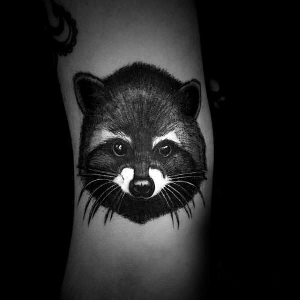 White And Black Ink Male Small Raccoon Head Tattoo On Forearm