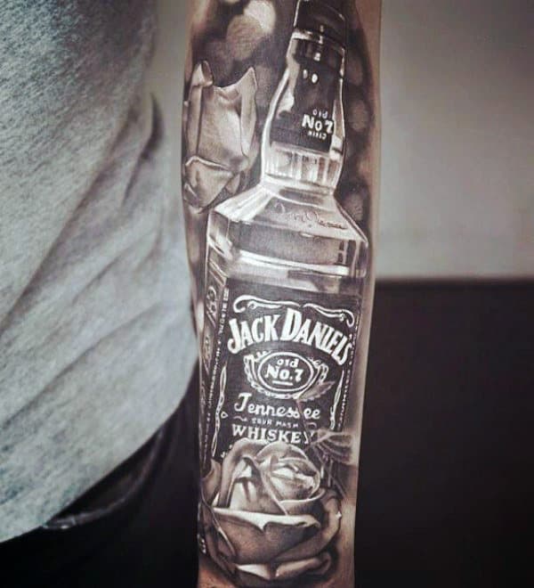 White And Black Shaded Jack Daniels Bottle With Rose Flower Mens Forearm Tattoo