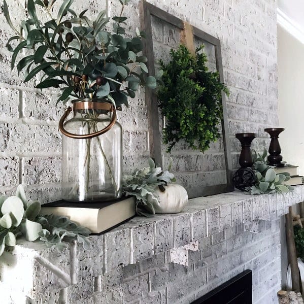 white-washed brick fireplace 