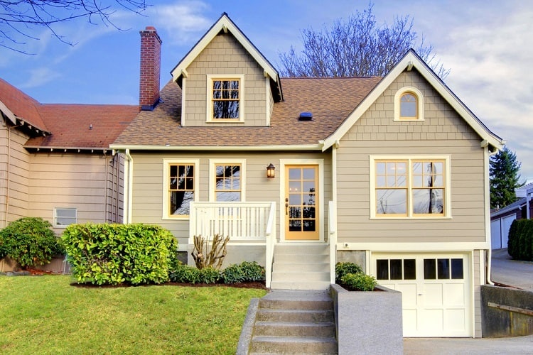 white and yellow craftsman exterior window trim