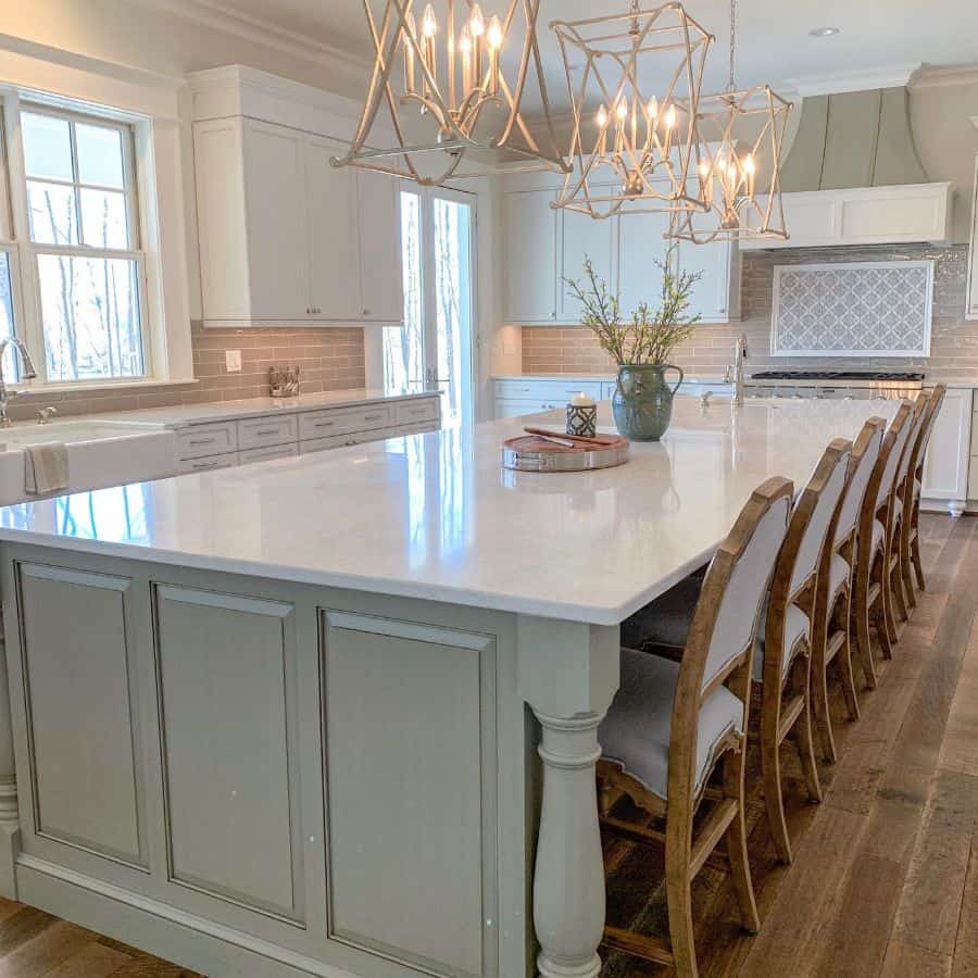 large simple and elegant country kitchen white cabinets pale green island 