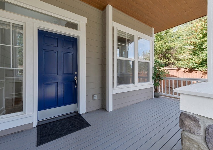 white large modern exterior window trim blue front door