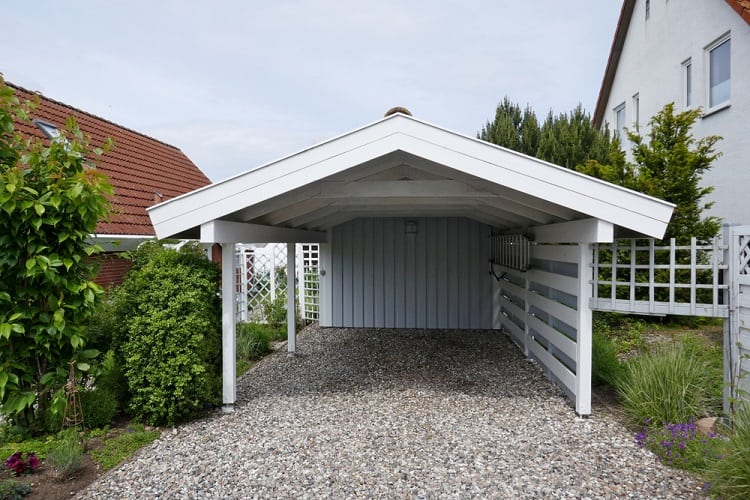 white pitch roof wooden small carport