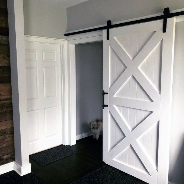 White Wood Barn Door Ideas With Black Painted Sliding Hardware
