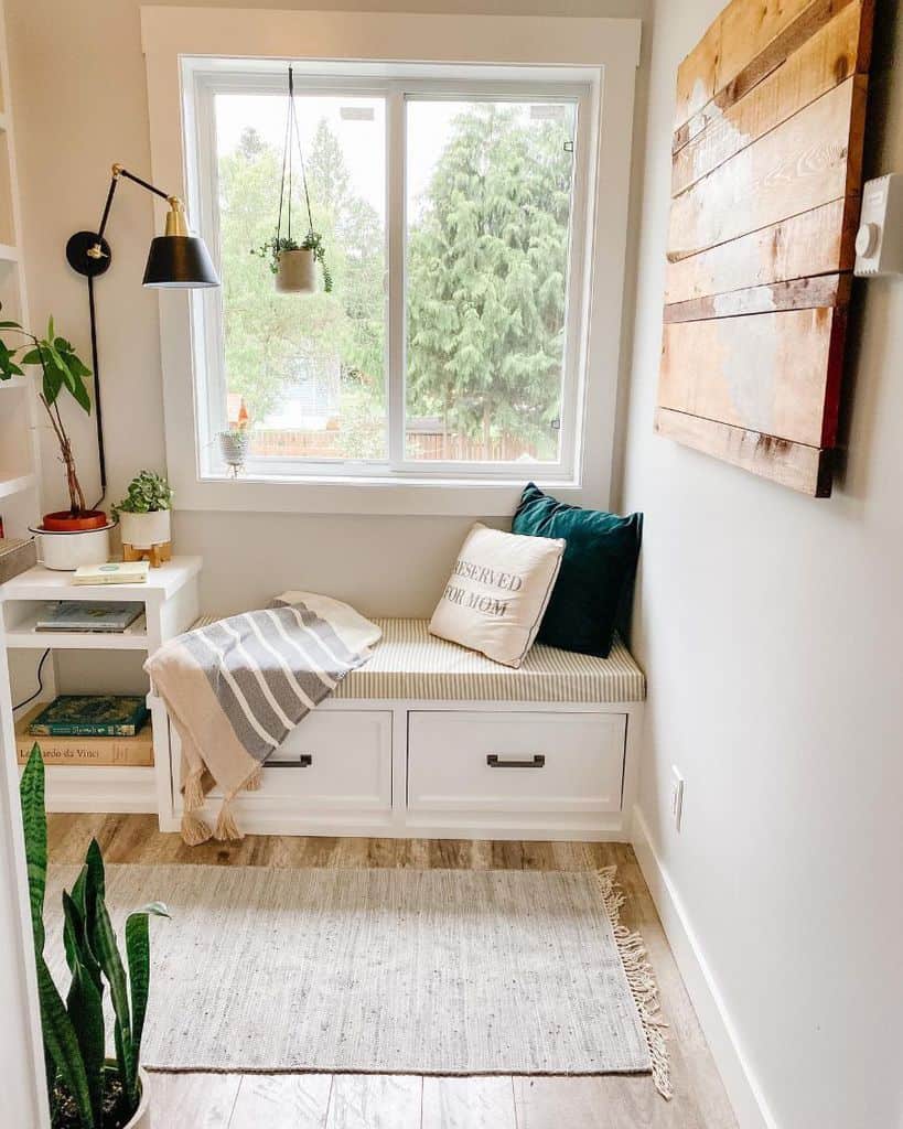 small window reading nook with bench and storage 