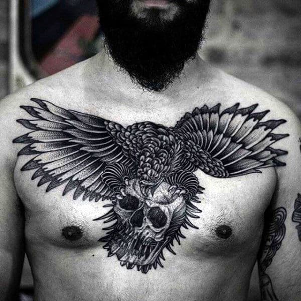Wings With Skull Pointillism Mens Chest Tattoos
