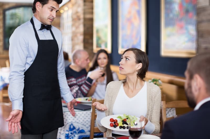 woman treats waiter poorly