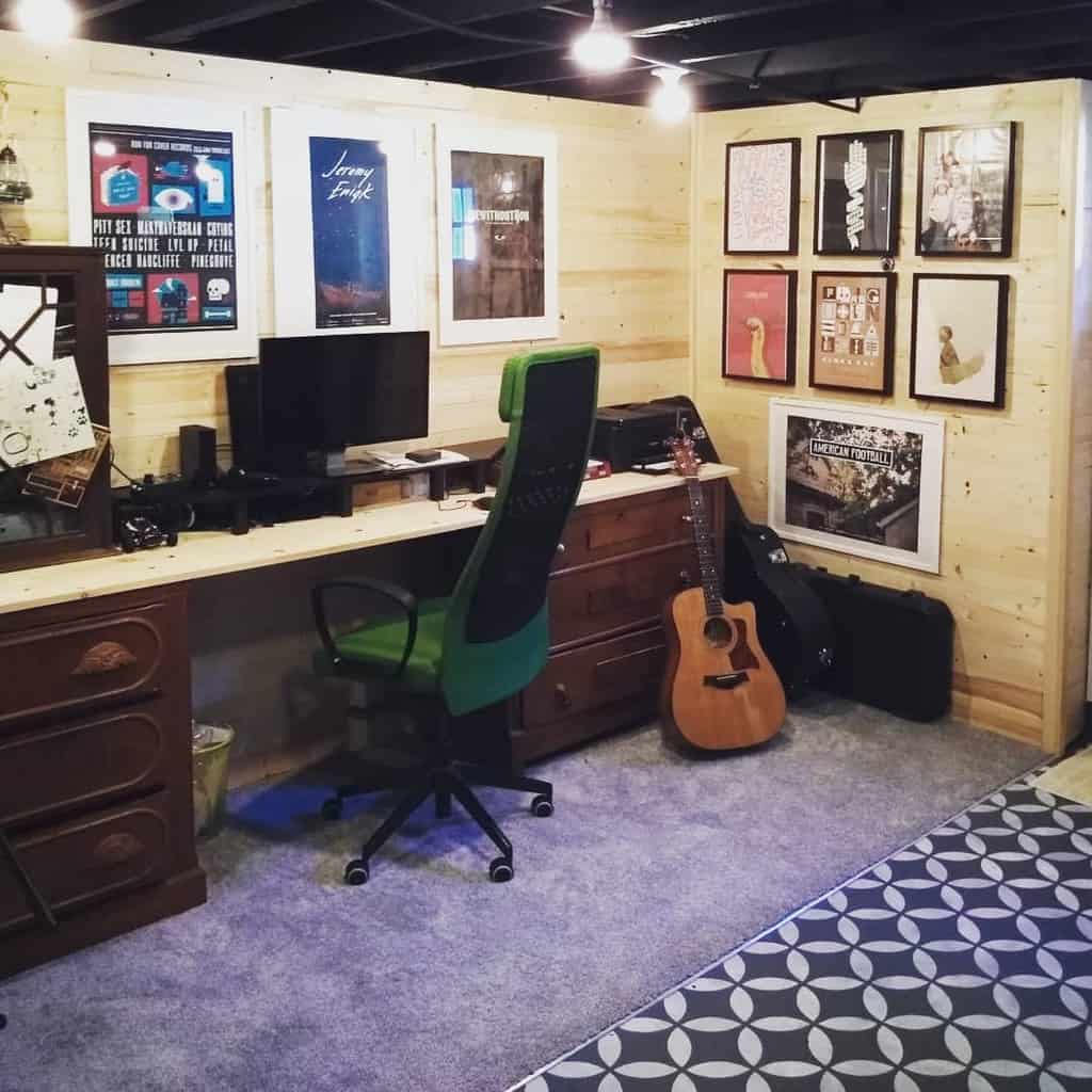 music room/office with wall posters