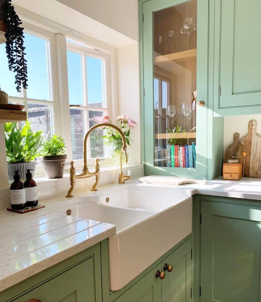 wood kitchen green cupboards window