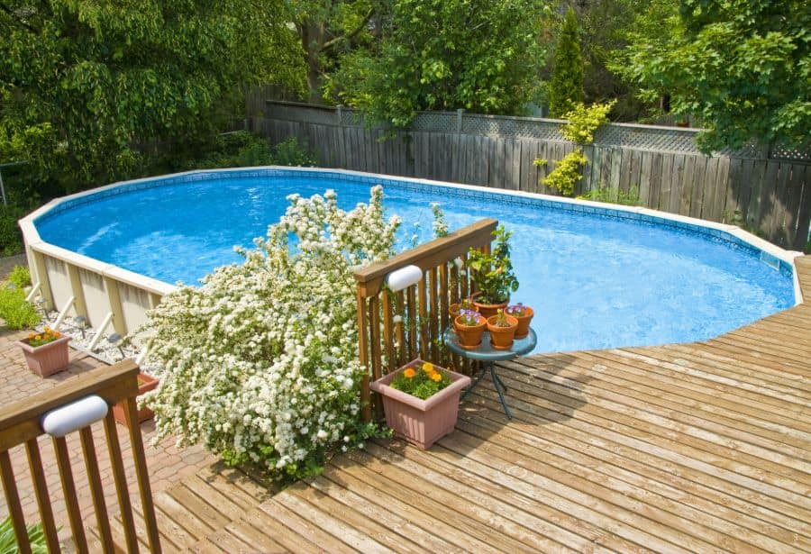 above-ground pool with wood deck 