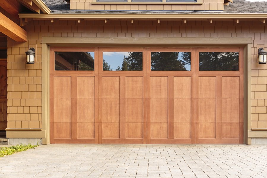 Wood Siding With White Painted Garage Door Windows