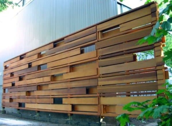 wooden fence with varied panel sizes