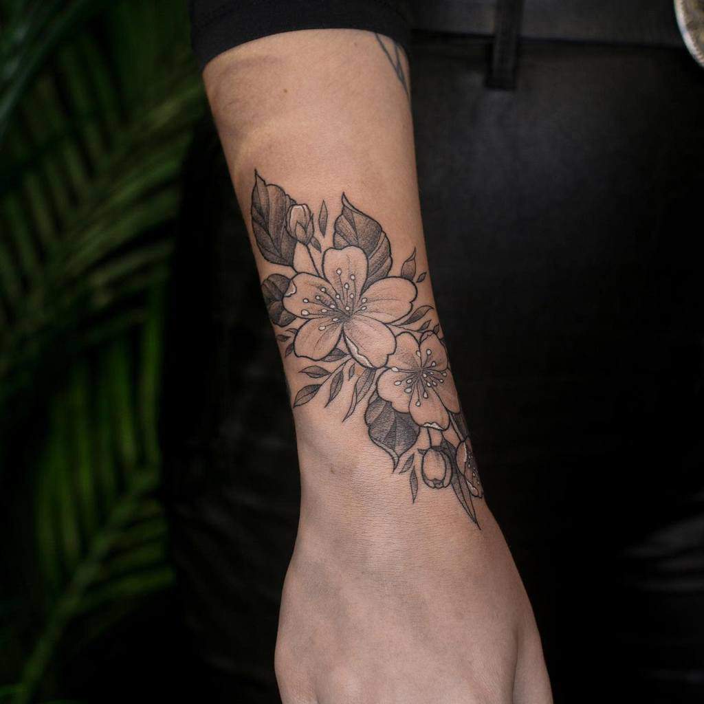 wrap-around-flower-wrist-tattoo-meganbirdtattoo
