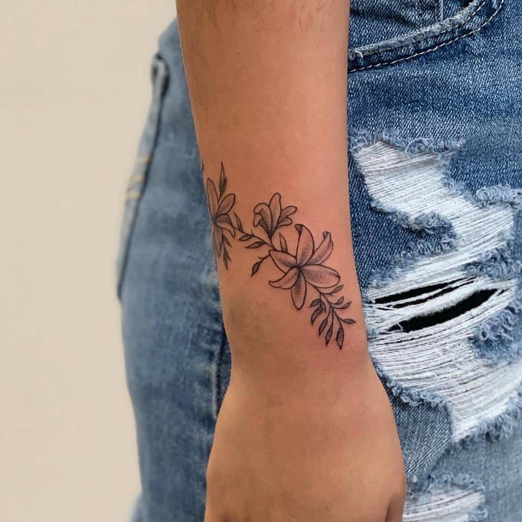 wrap around flower wrist tattoo mooseinks
