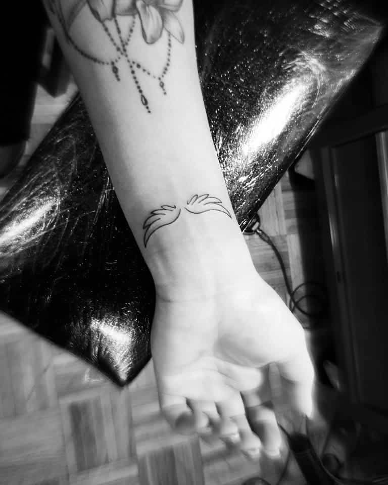 wrist-uncharted-angel-wing-tattoo-magikbox_tattoos