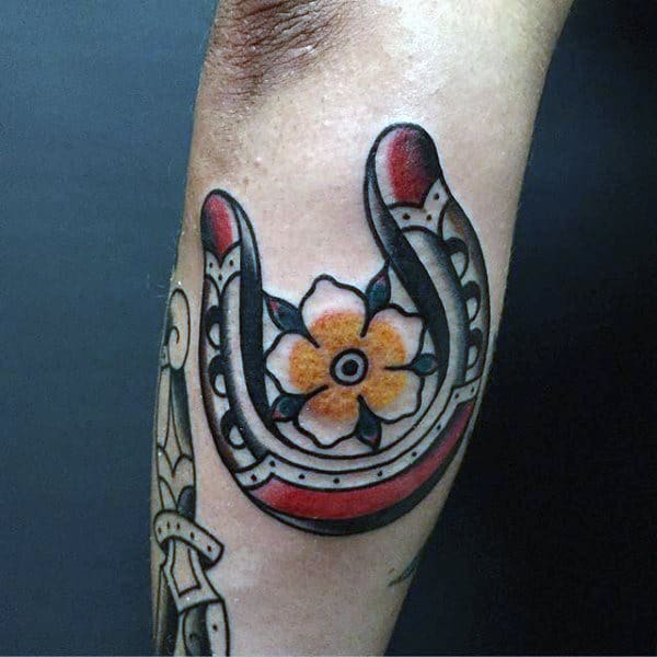 Yellow Flower With Horseshoe Mens Outer Forearm Tattoos