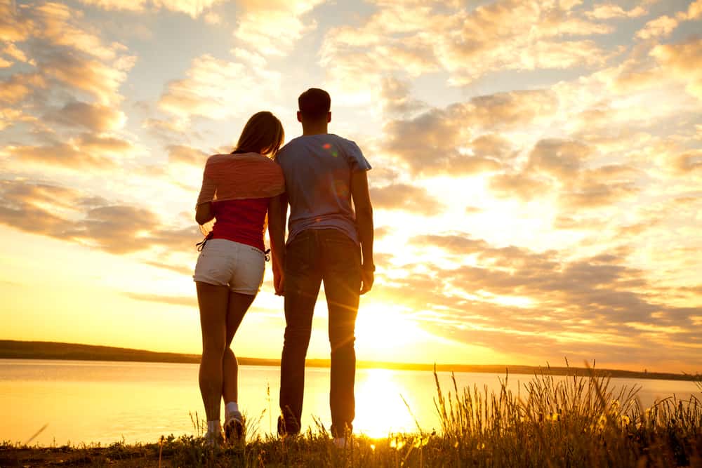 young-couple-looking-sunset