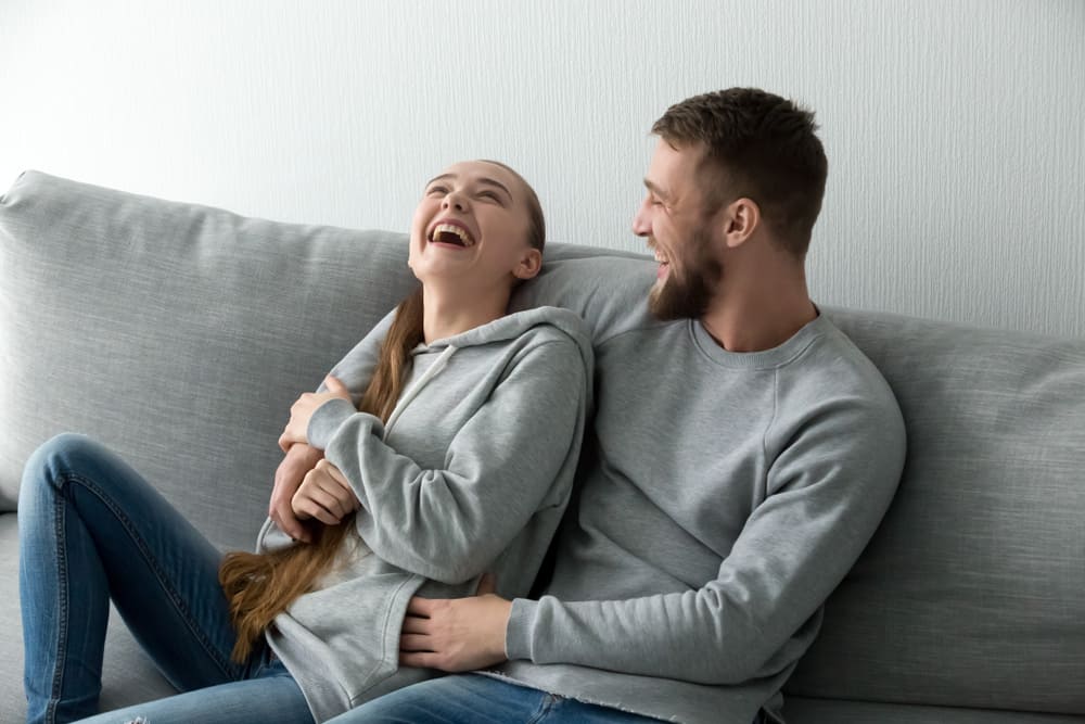 young happy couple having fun talking