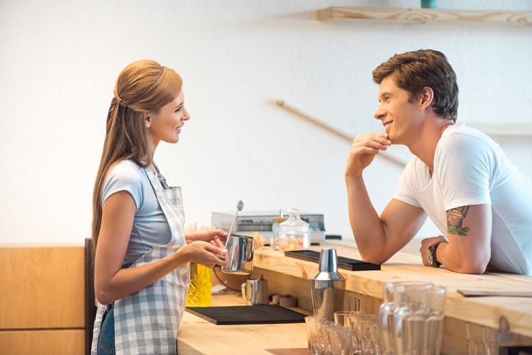 Young Man Flirting With Barista